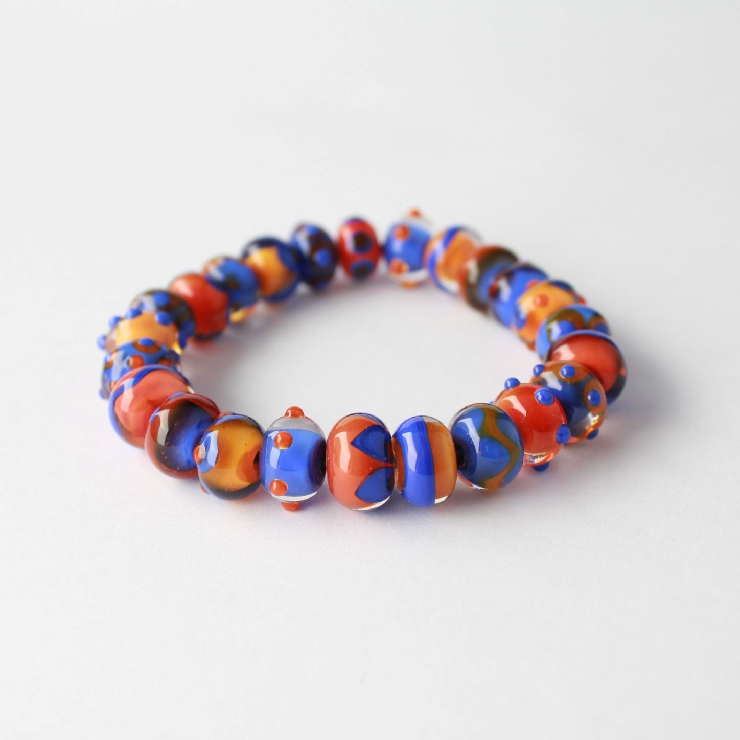 Bracelet de perles de verre, couleurs orange et bleue